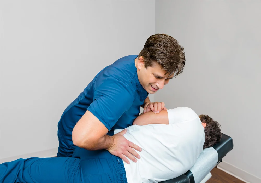Chiropractor Marlton NJ James Gaeta Adjusting Patient